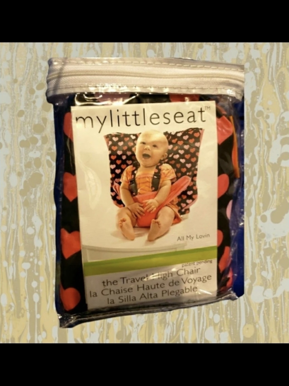 Unisex My Little Seat All My Lovin Travel Highchair. 

Retails new: $28.

For ba